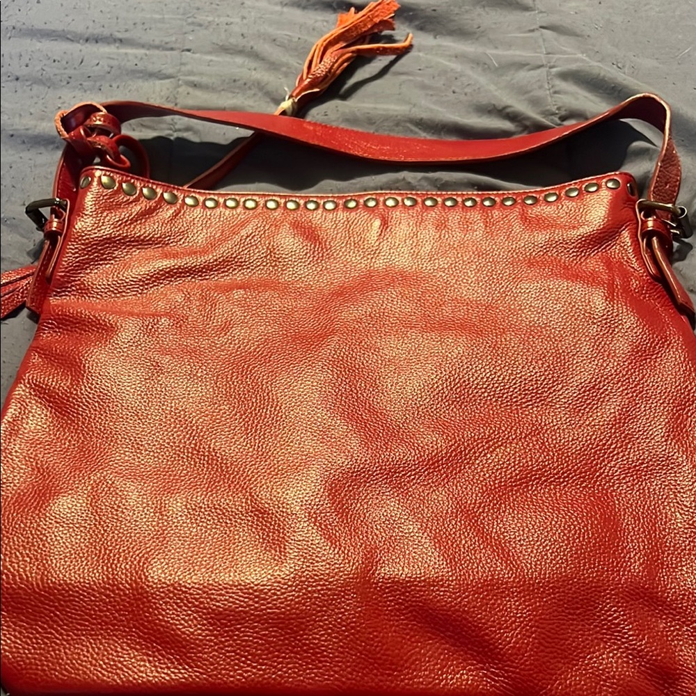 Red Leather Shoulder Bag with Sophisticated Detailing